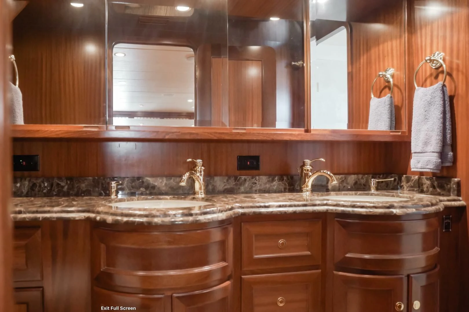 a bathroom with a sink and cabinets aboard AL DI LA Yacht for Sale
