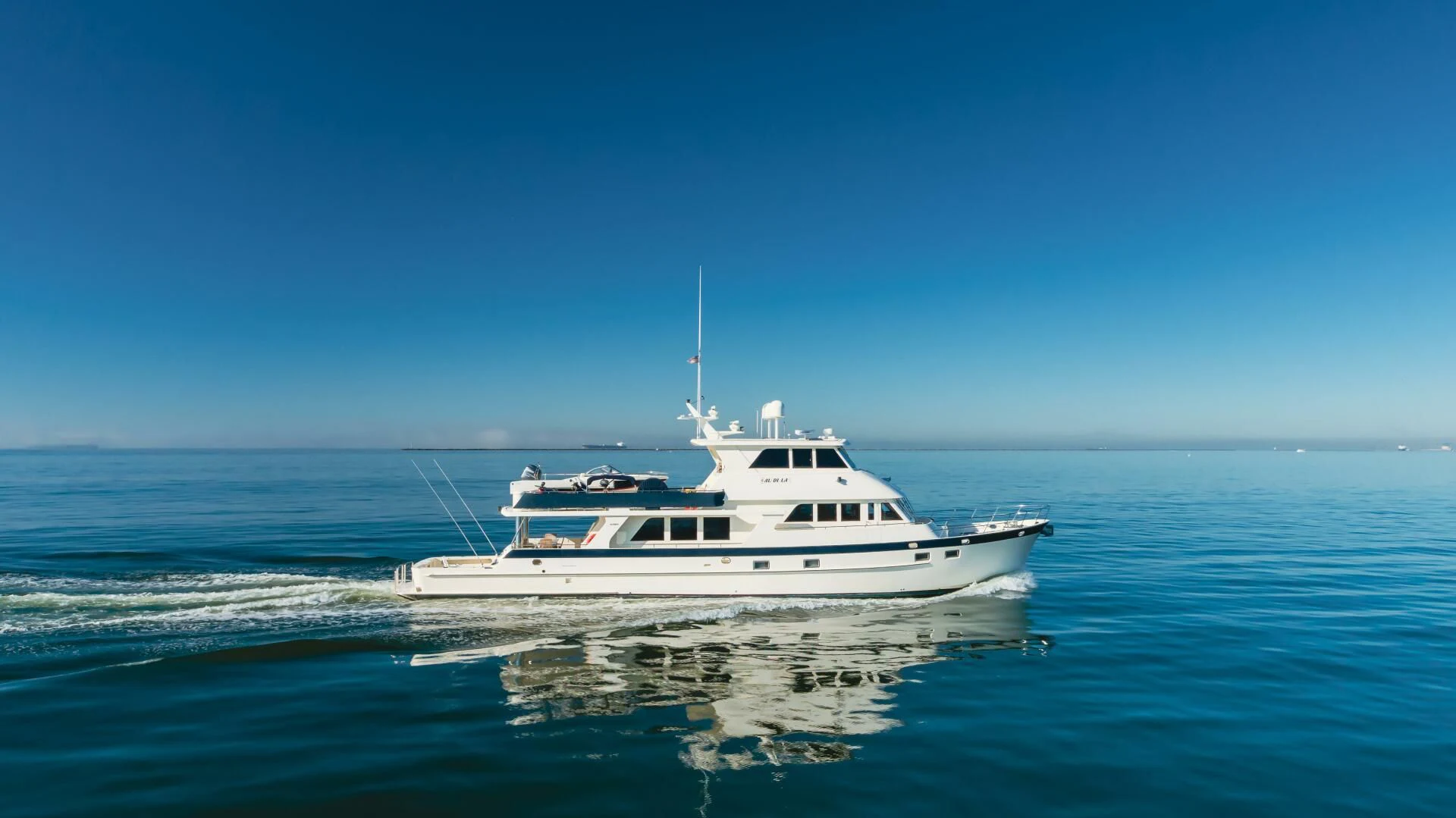 a white boat in the water aboard AL DI LA Yacht for Sale