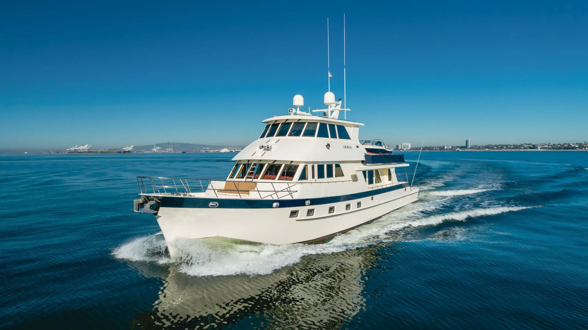 a large white boat in the water aboard AL DI LA Yacht for Sale