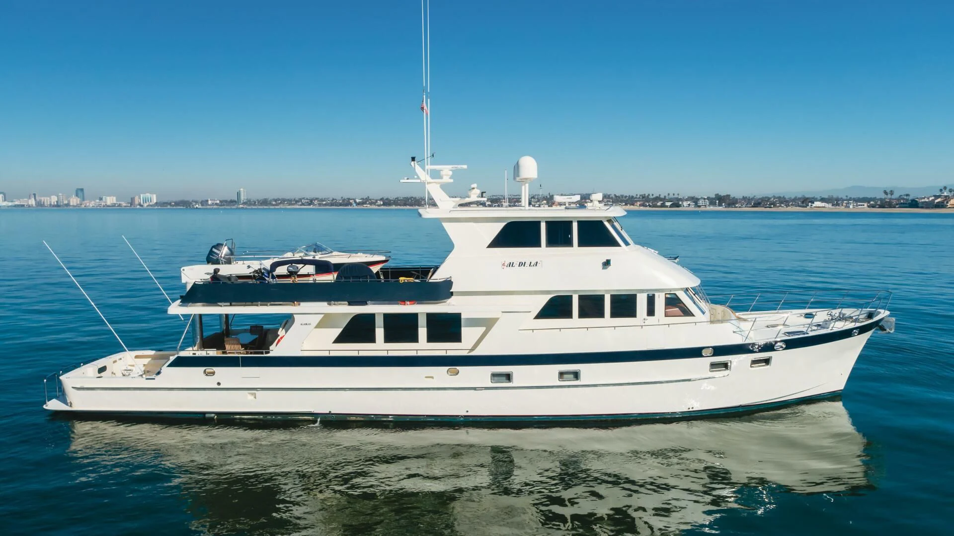 a white yacht in the water aboard AL DI LA Yacht for Sale