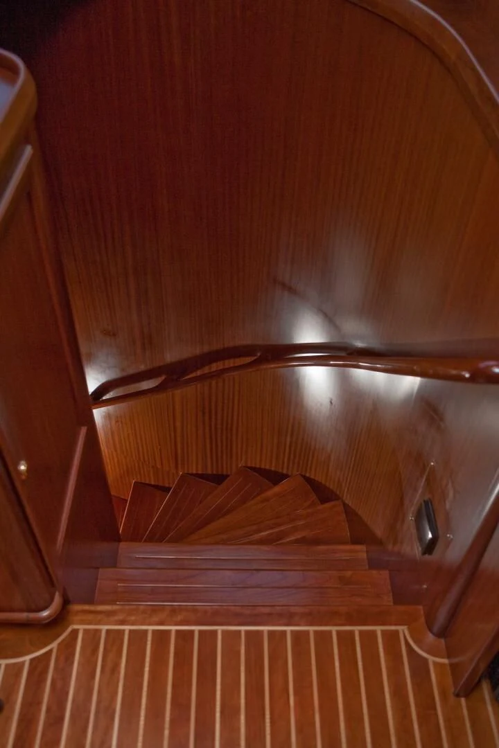 a kitchen sink with wooden cabinets aboard AL DI LA Yacht for Sale