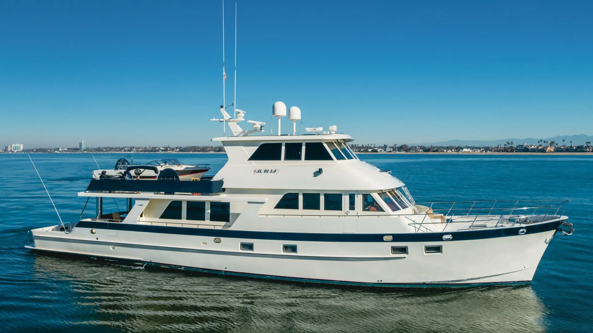 a white yacht in the water aboard AL DI LA Yacht for Sale