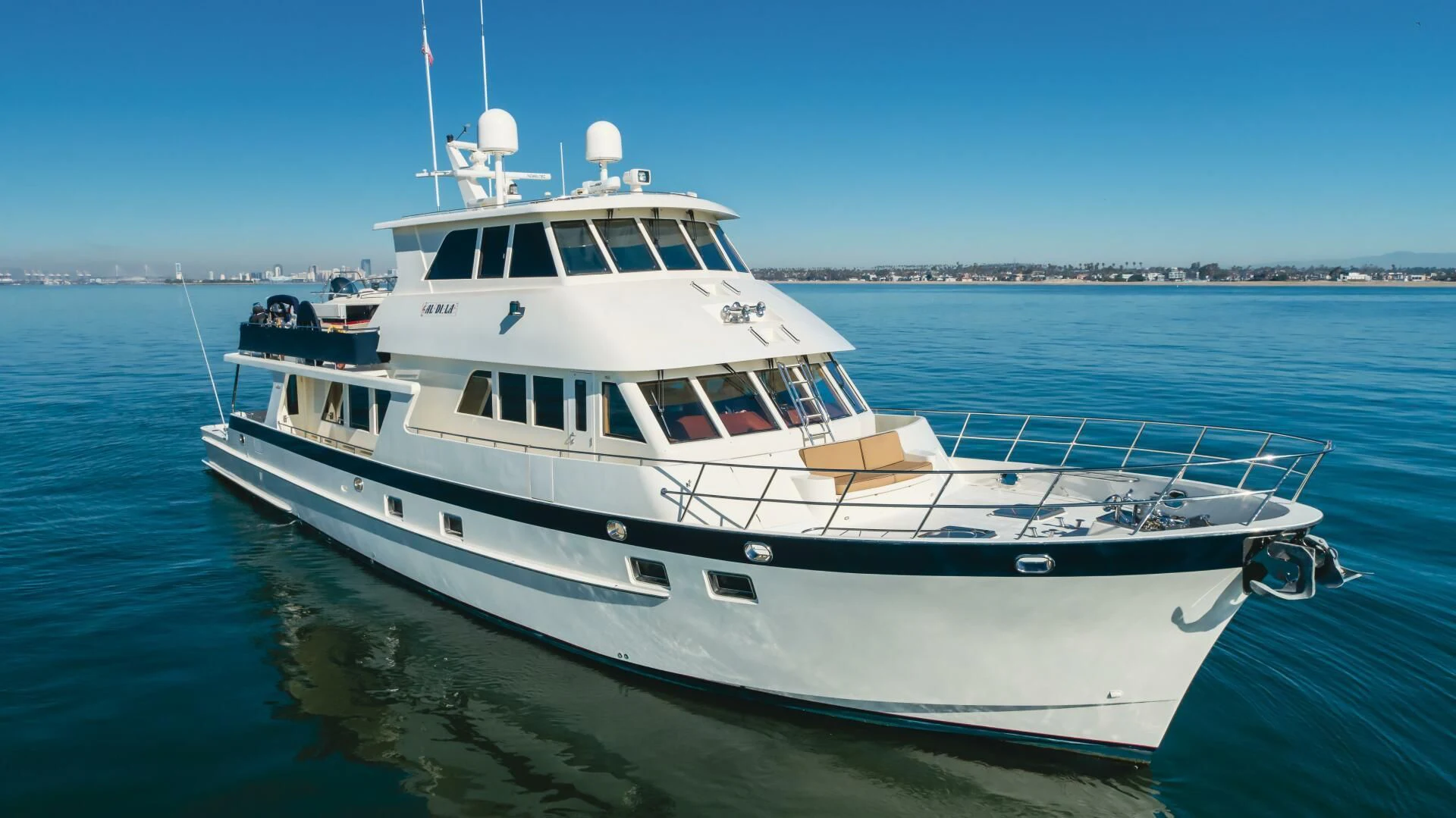 a white yacht on the water aboard AL DI LA Yacht for Sale