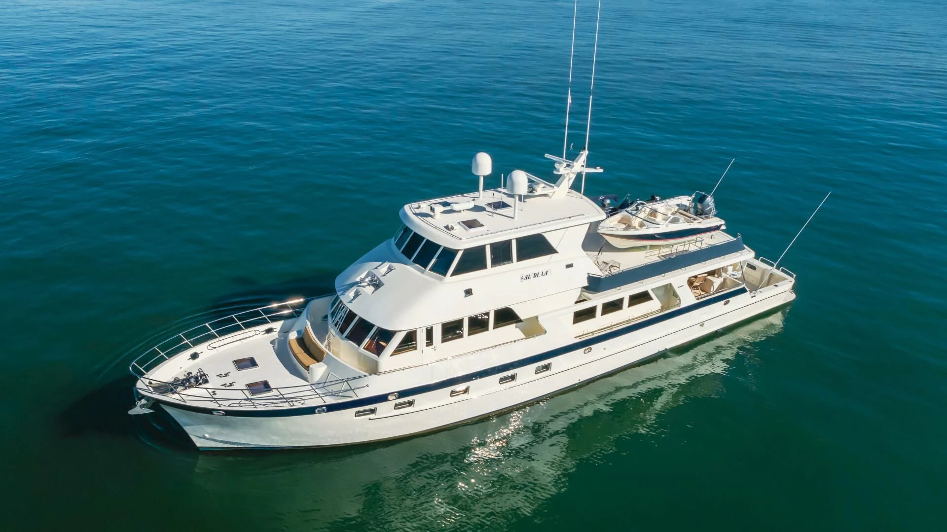 a white boat in the water aboard AL DI LA Yacht for Sale