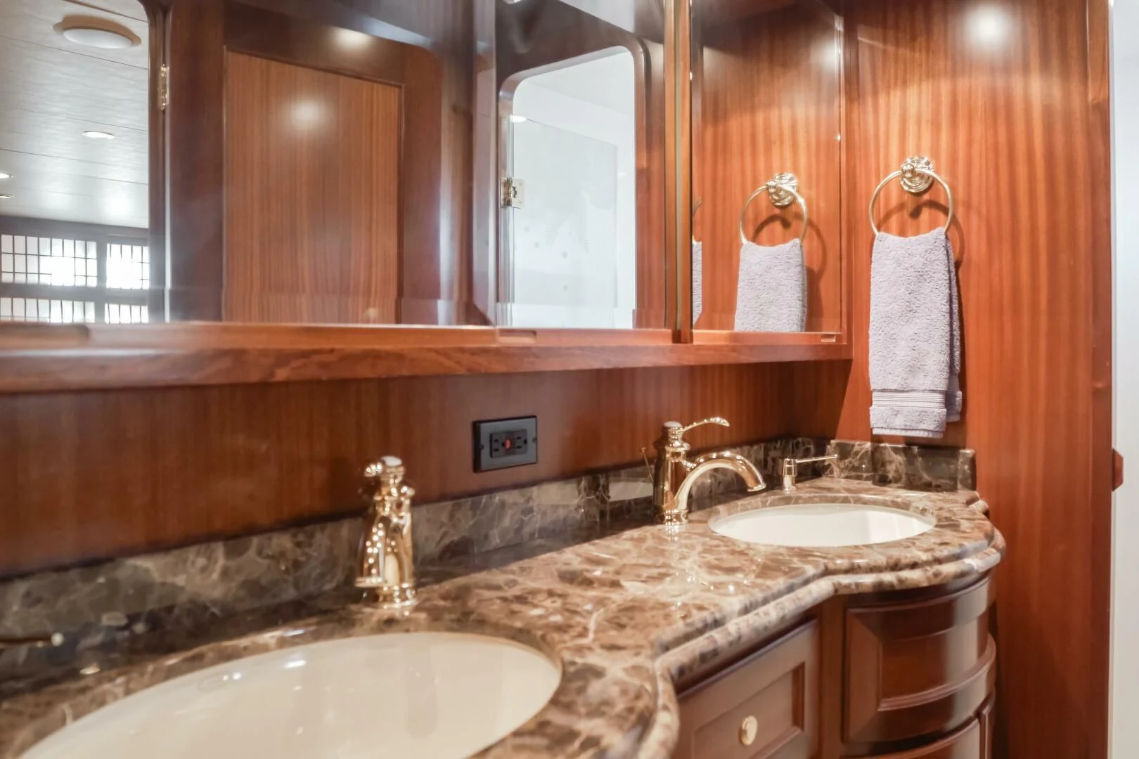 a bathroom with two sinks aboard AL DI LA Yacht for Sale
