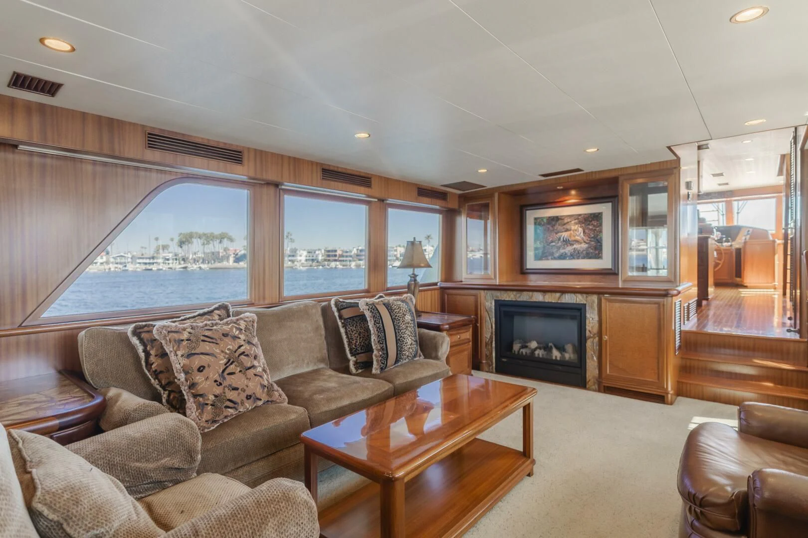 a living room with a fireplace aboard AL DI LA Yacht for Sale