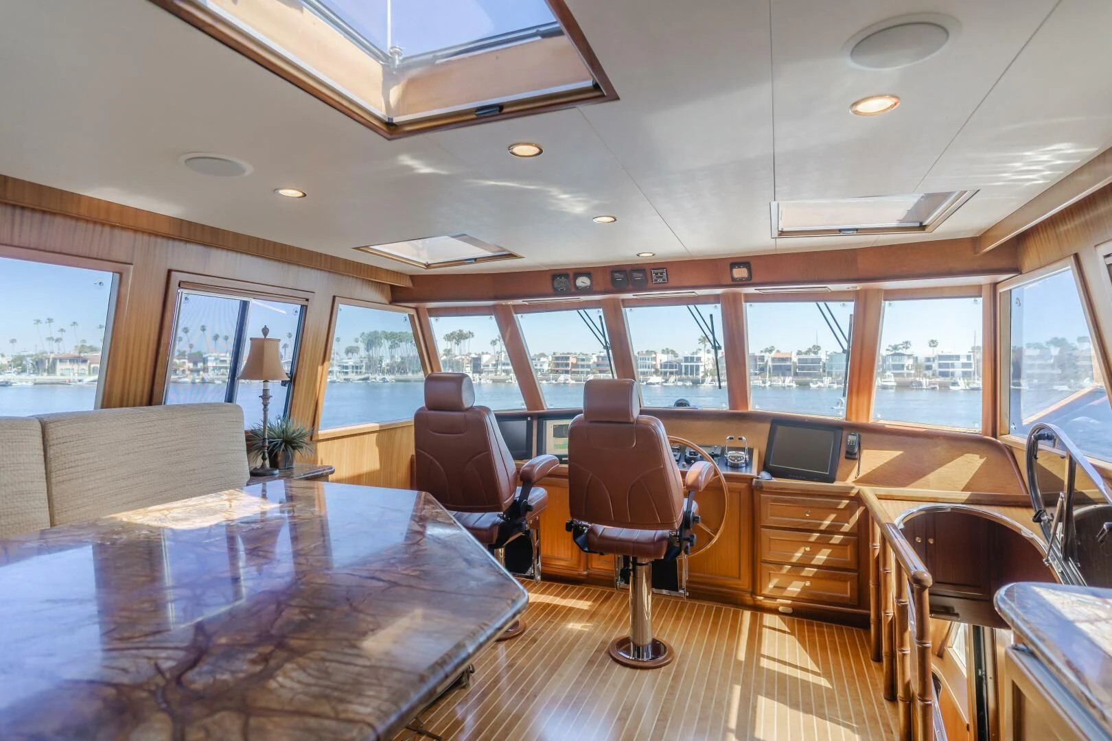 a room with a table and chairs aboard AL DI LA Yacht for Sale
