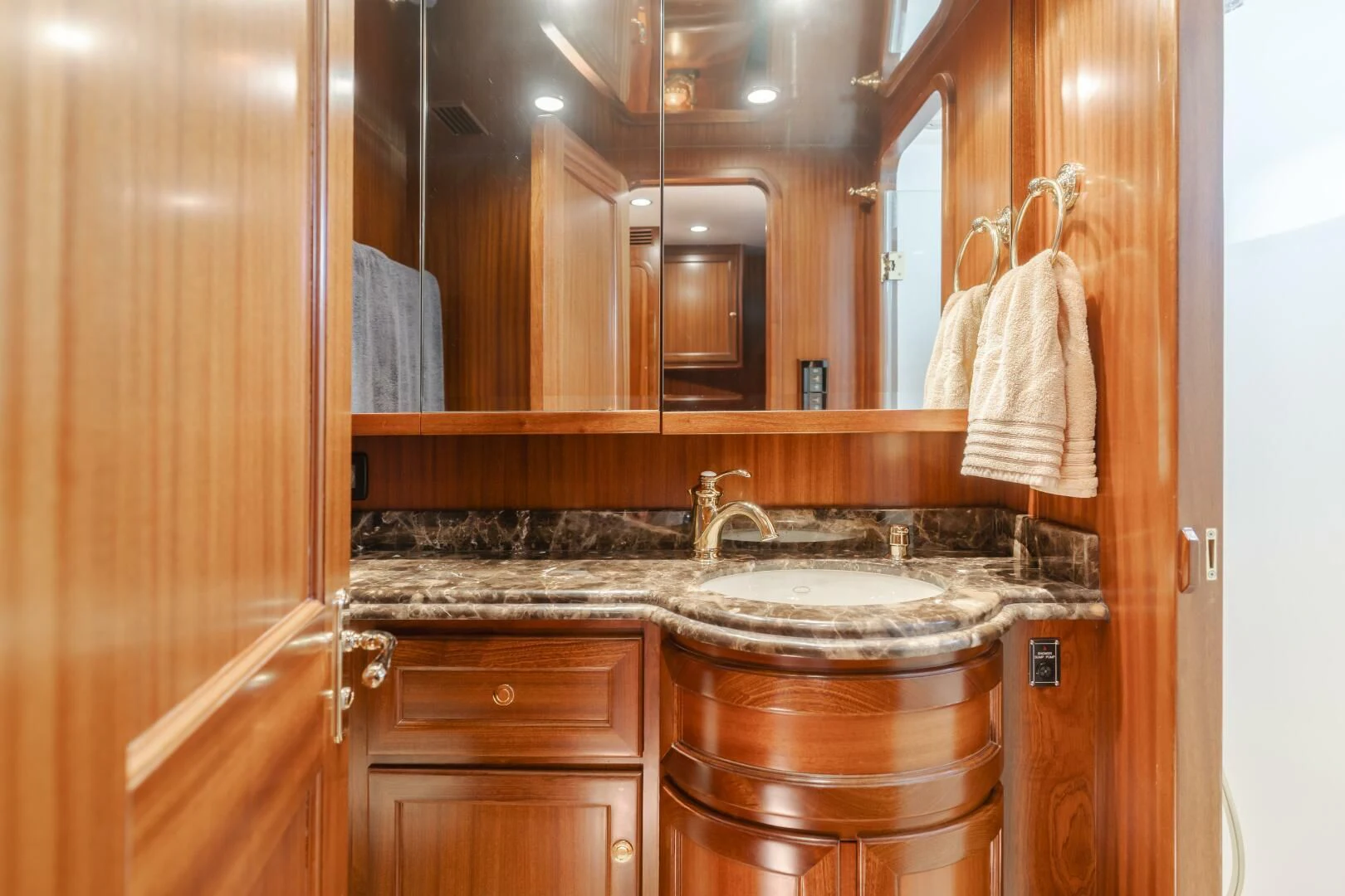 a bathroom with a sink and cabinets aboard AL DI LA Yacht for Sale
