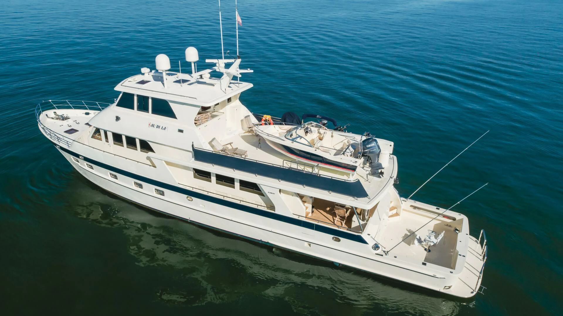 a white boat on the water aboard AL DI LA Yacht for Sale