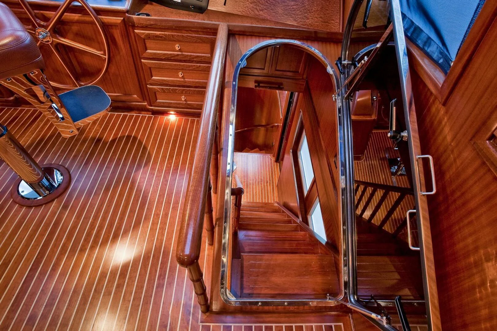 a wooden staircase in a house aboard AL DI LA Yacht for Sale