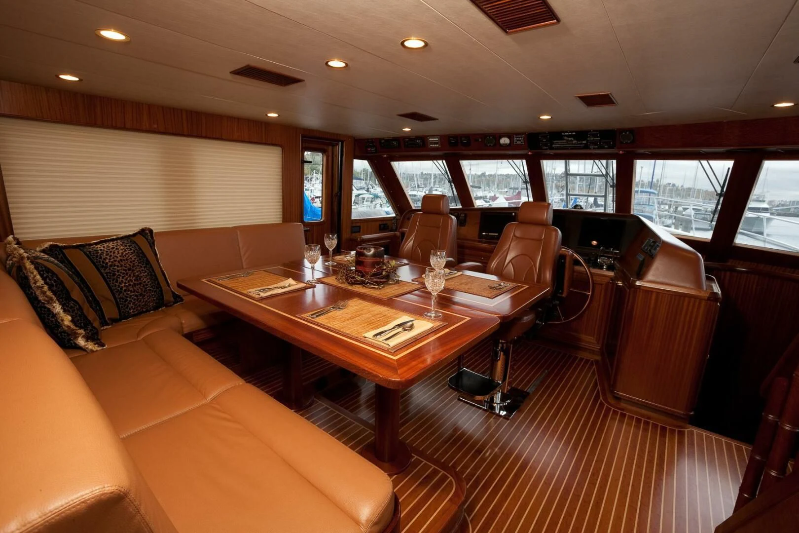 a room with a table and chairs aboard AL DI LA Yacht for Sale