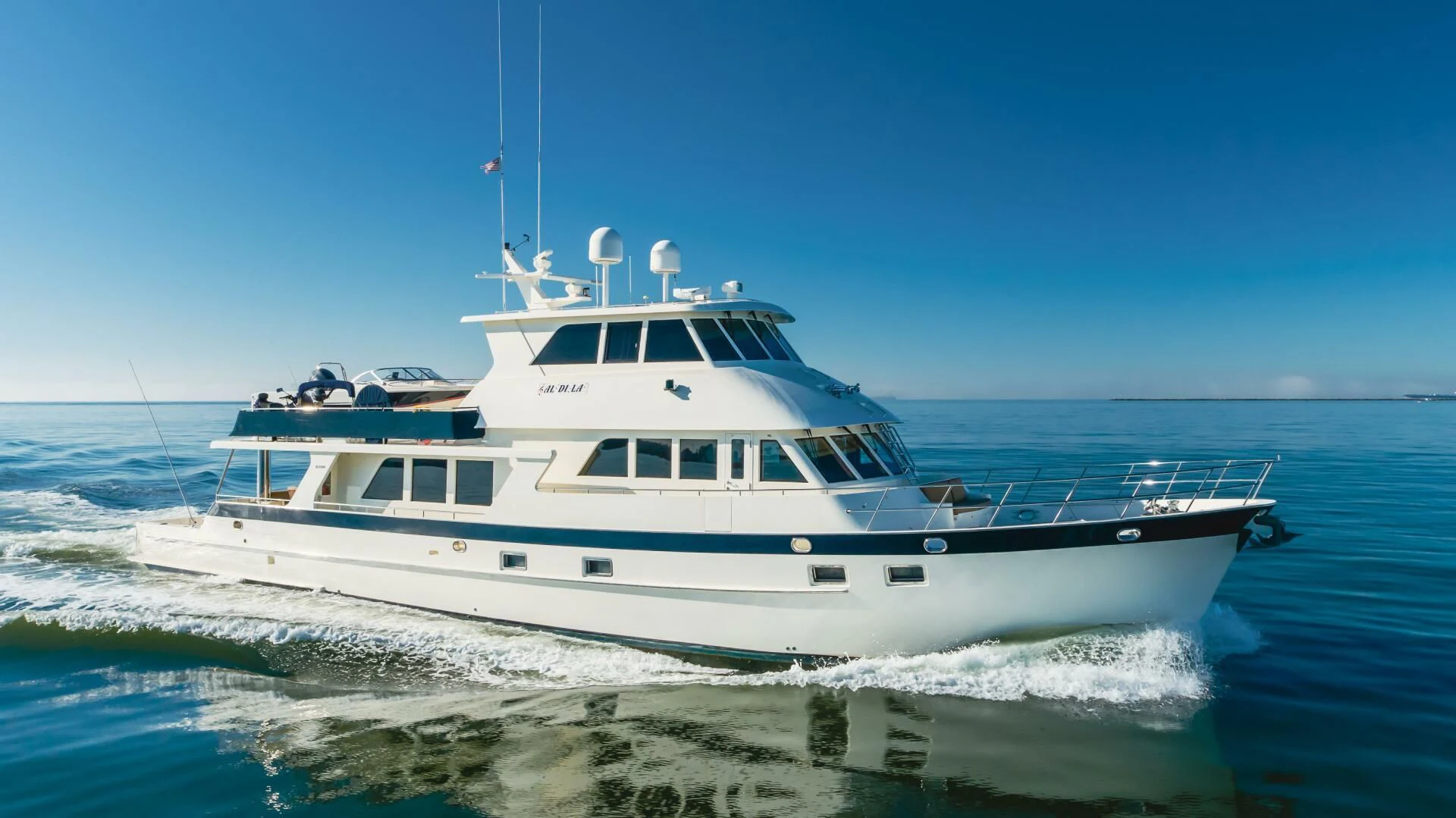 a white yacht in the water aboard AL DI LA Yacht for Sale