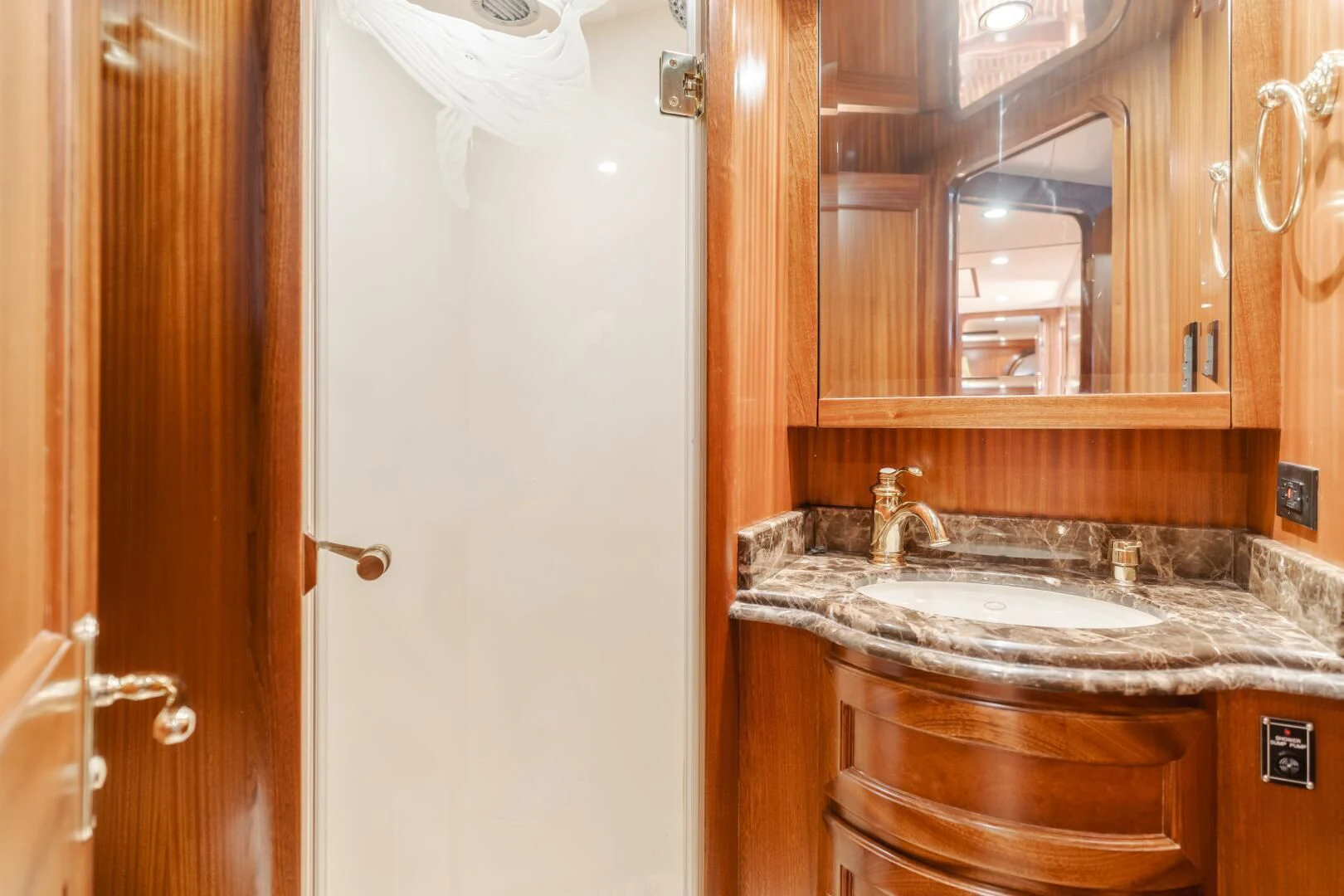a bathroom with a sink and cabinets aboard AL DI LA Yacht for Sale