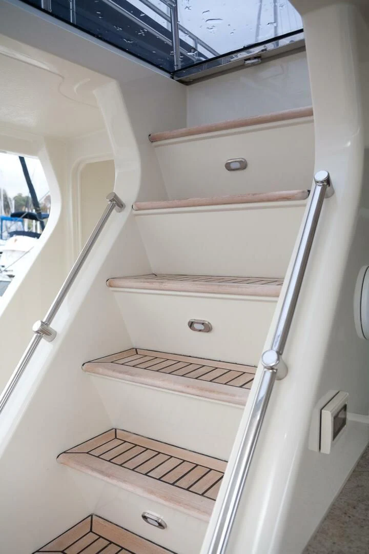 a white cabinet with a door aboard AL DI LA Yacht for Sale