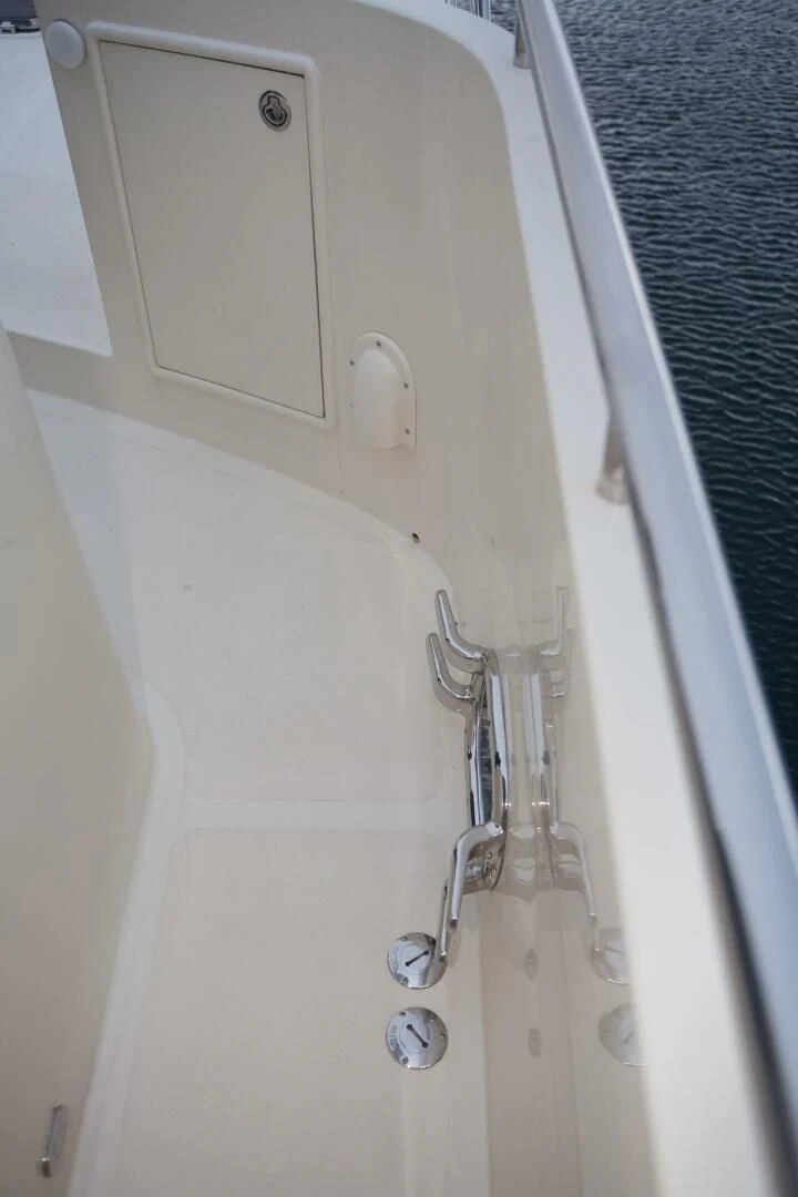 a white door with a handle aboard AL DI LA Yacht for Sale