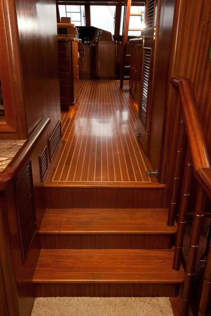 a wooden staircase in a house aboard AL DI LA Yacht for Sale