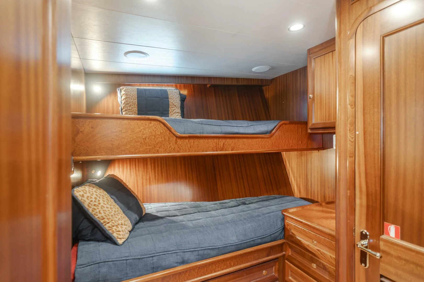 a bed in a room aboard AL DI LA Yacht for Sale