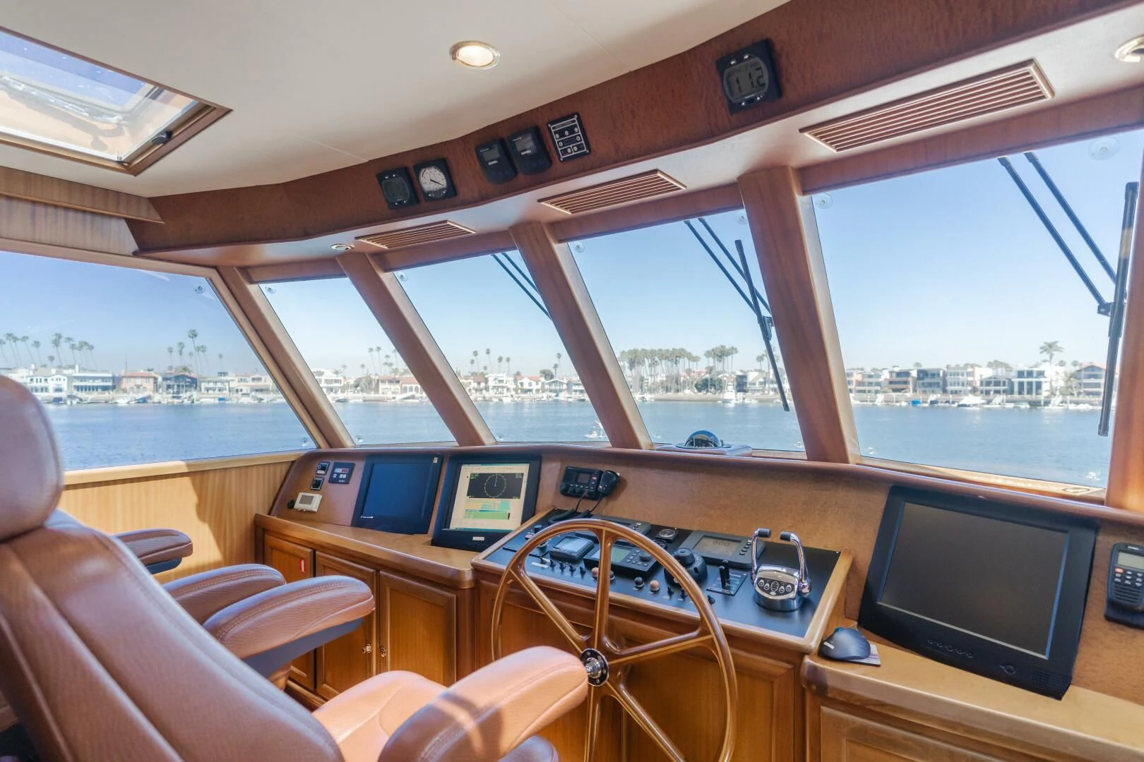 inside of a vehicle with a large window and a view of the city aboard AL DI LA Yacht for Sale