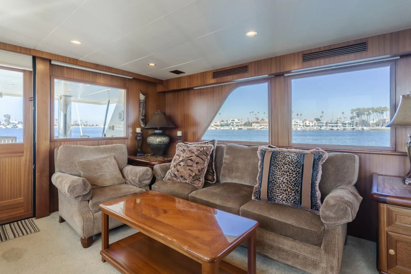 a living room with a large window aboard AL DI LA Yacht for Sale