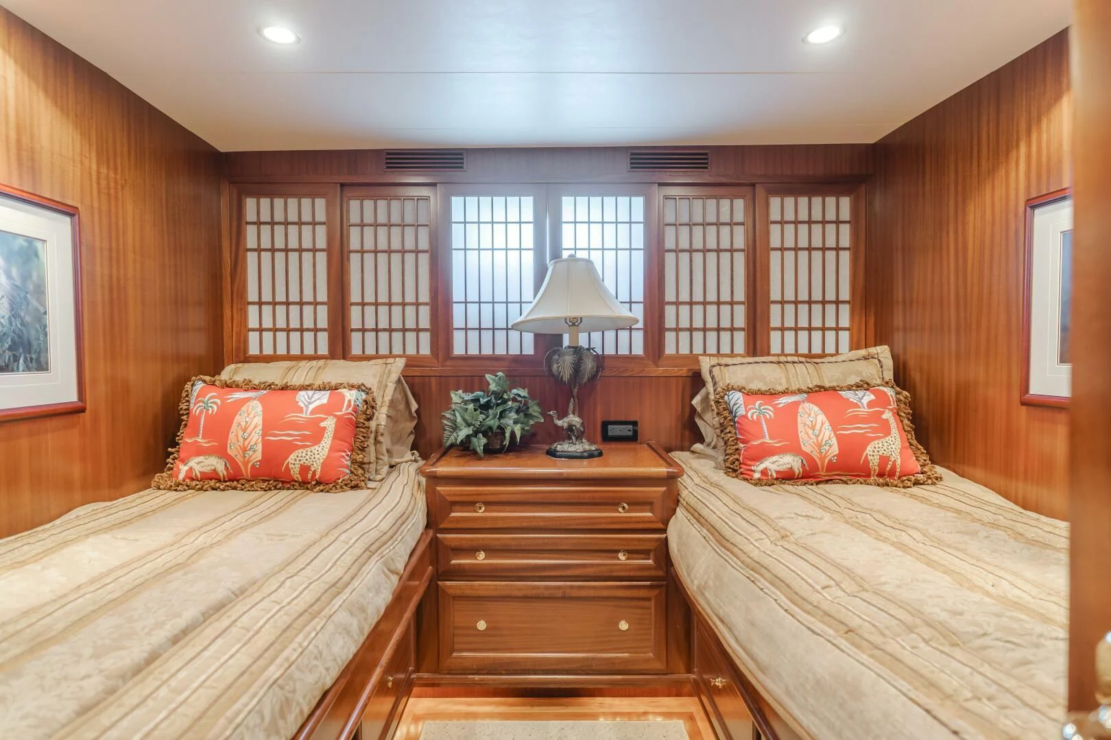 a bedroom with two beds aboard AL DI LA Yacht for Sale