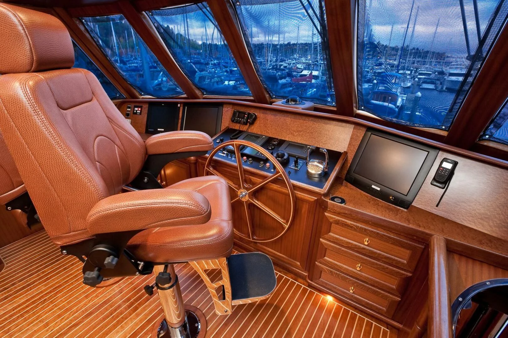 a room with a tv and a chair aboard AL DI LA Yacht for Sale