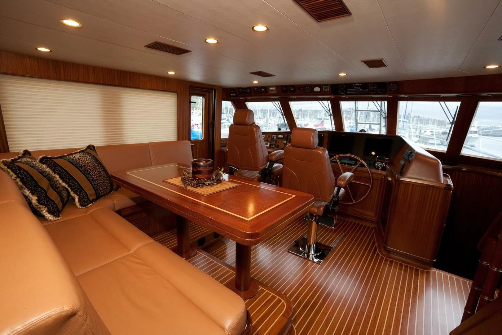 a room with a table and chairs aboard AL DI LA Yacht for Sale