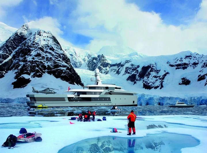 people on a snowy mountain aboard ANAWA Yacht for Sale