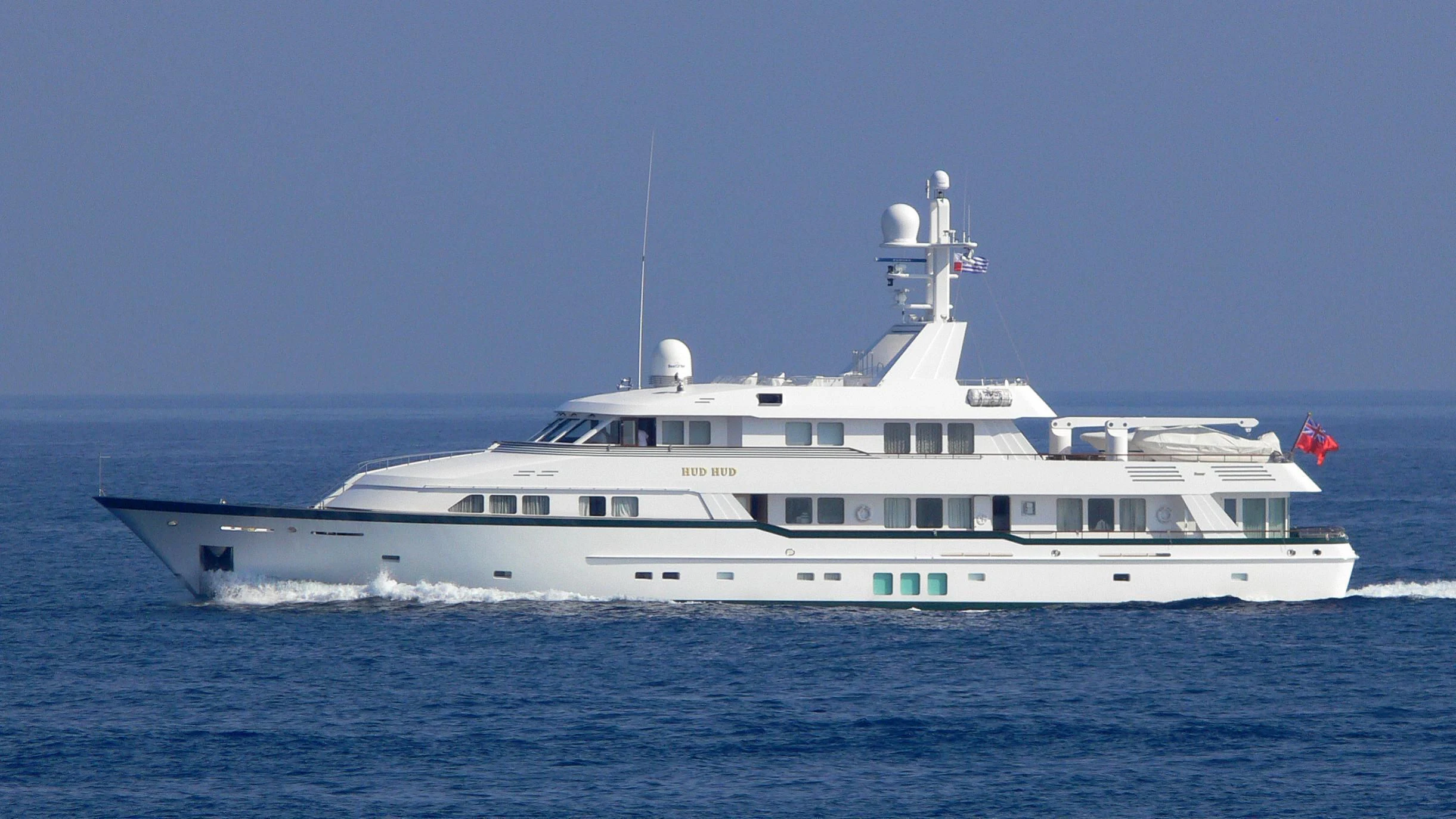a large white boat aboard HUD HUD Yacht for Sale