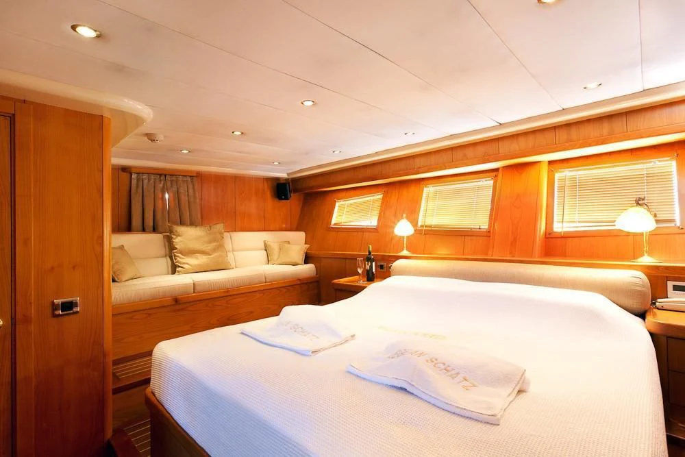 a room with two beds aboard SCHATZ Yacht for Sale