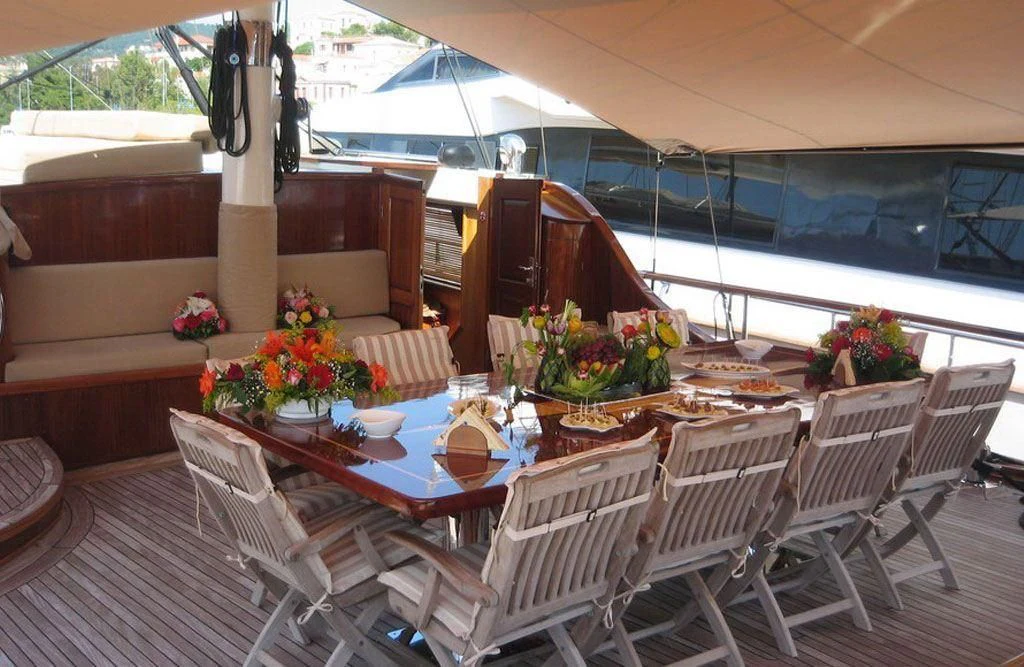a table set for a meal aboard SCHATZ Yacht for Sale