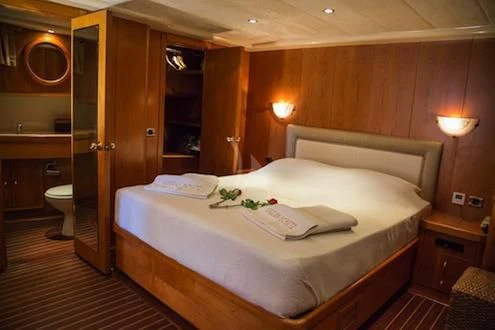 a bed in a hotel room aboard SCHATZ Yacht for Sale