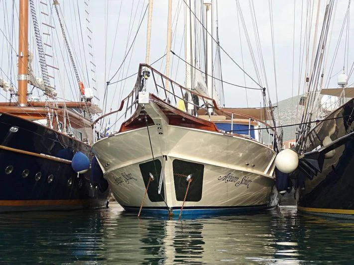a boat docked in a harbor aboard SCHATZ Yacht for Sale