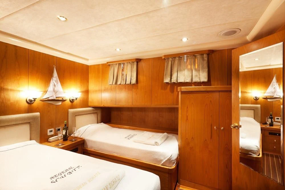 a room with two beds aboard SCHATZ Yacht for Sale