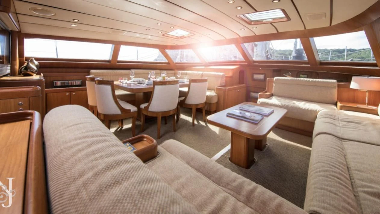 a room with couches and a table aboard MEDUSA Yacht for Sale