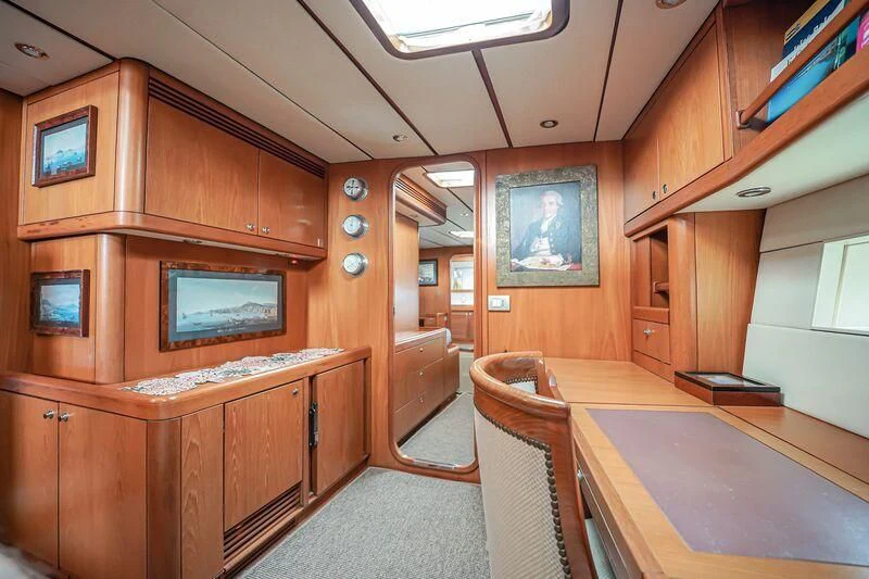 a room with a table and chairs aboard MEDUSA Yacht for Sale