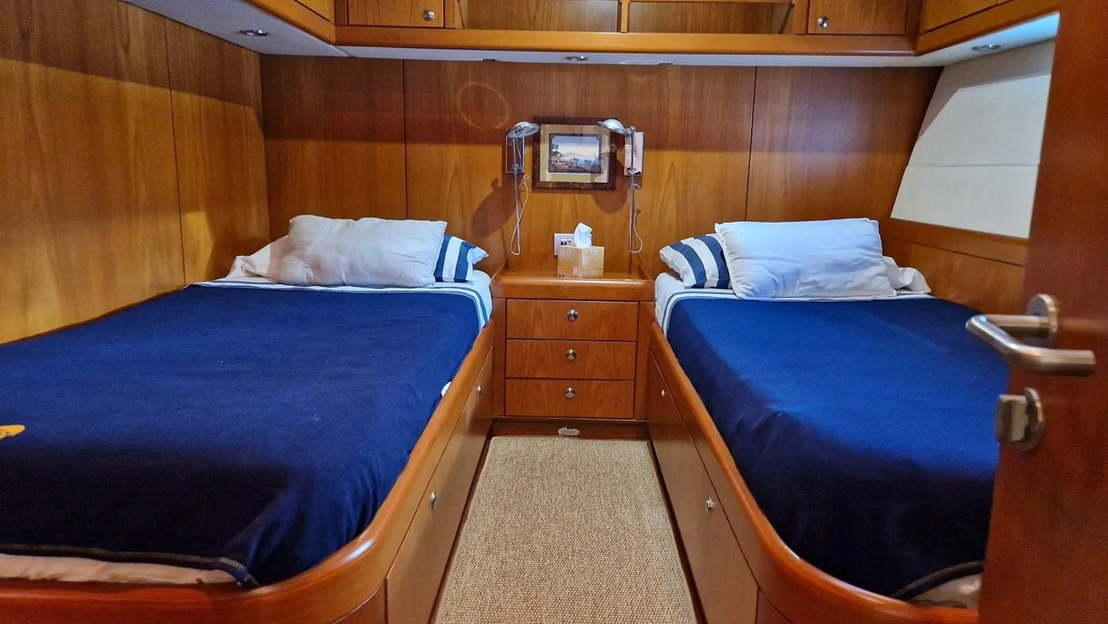 a couple of beds in a room aboard MEDUSA Yacht for Sale