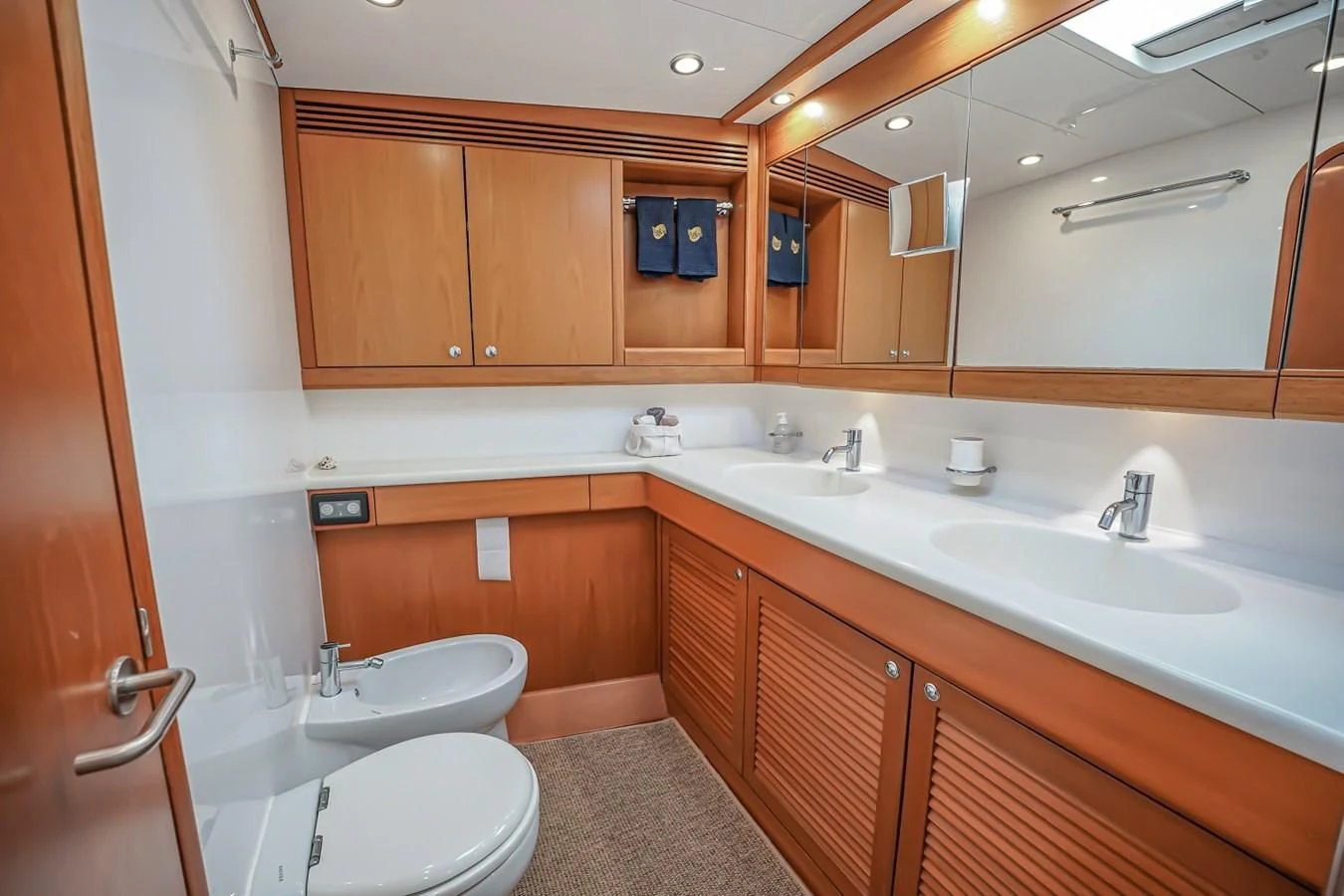 a bathroom with a large mirror aboard MEDUSA Yacht for Sale