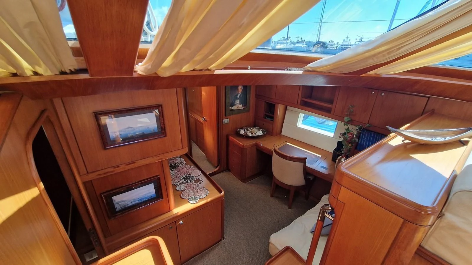 a room with a table and chairs aboard MEDUSA Yacht for Sale