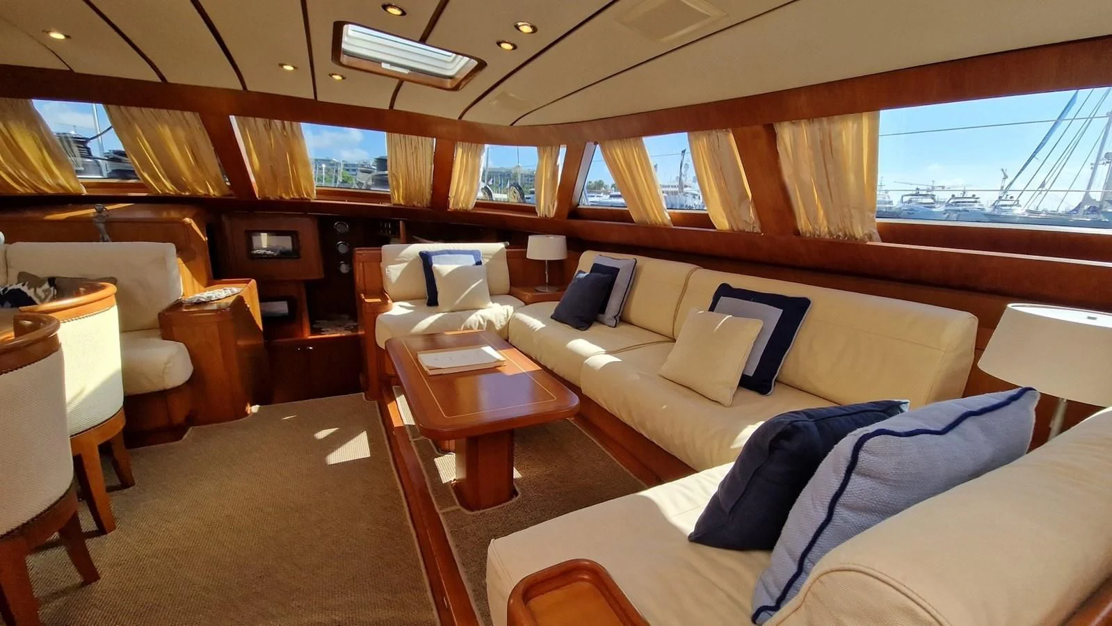 a room with a couch and a table aboard MEDUSA Yacht for Sale