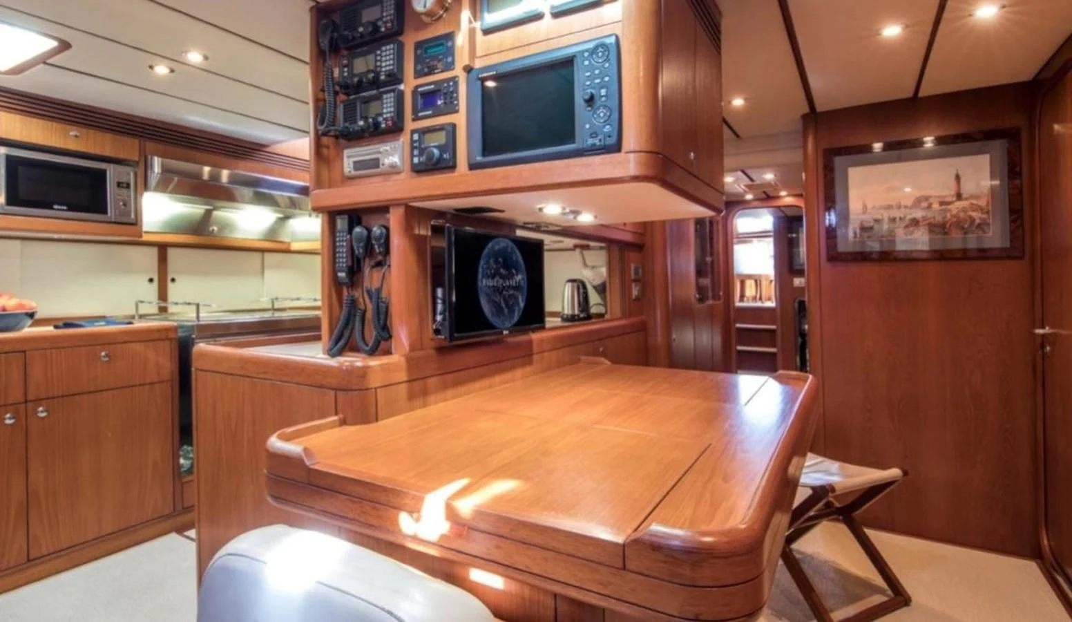 a wood table in a kitchen aboard MEDUSA Yacht for Sale