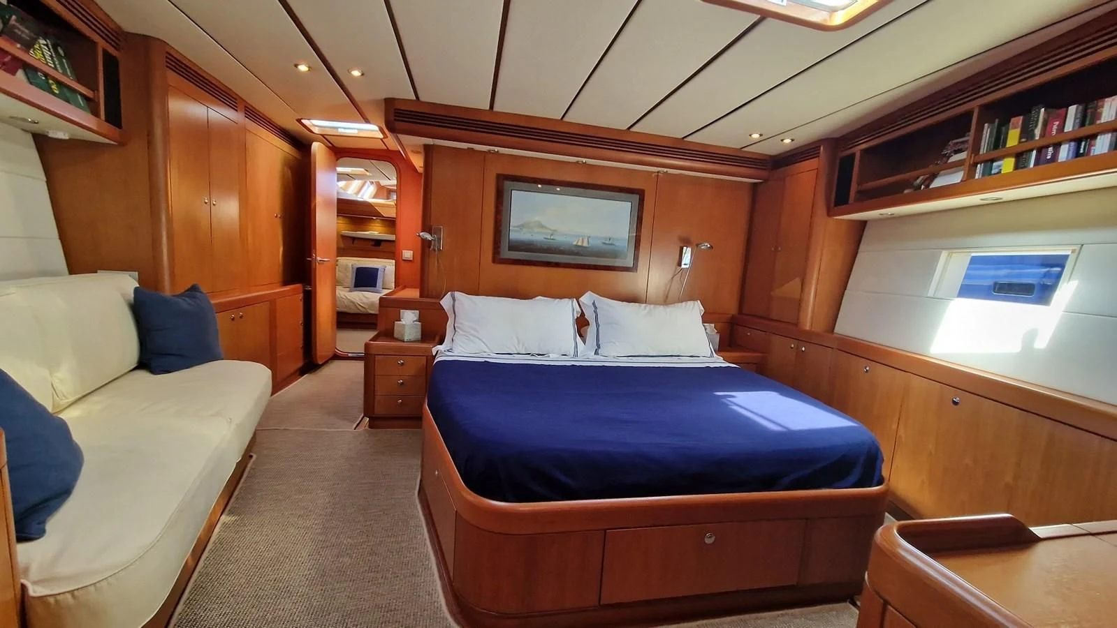 a room with a bed and a couch aboard MEDUSA Yacht for Sale
