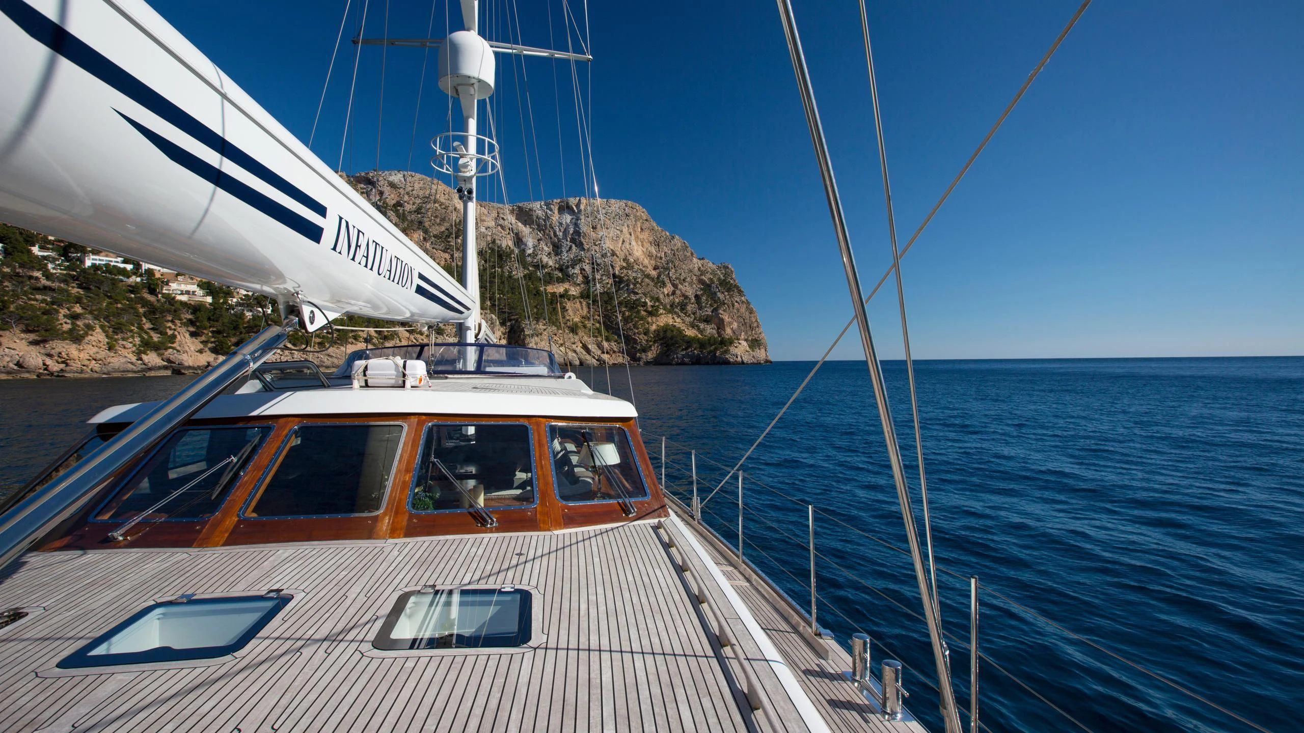 a boat on the water aboard INFATUATION Yacht for Sale