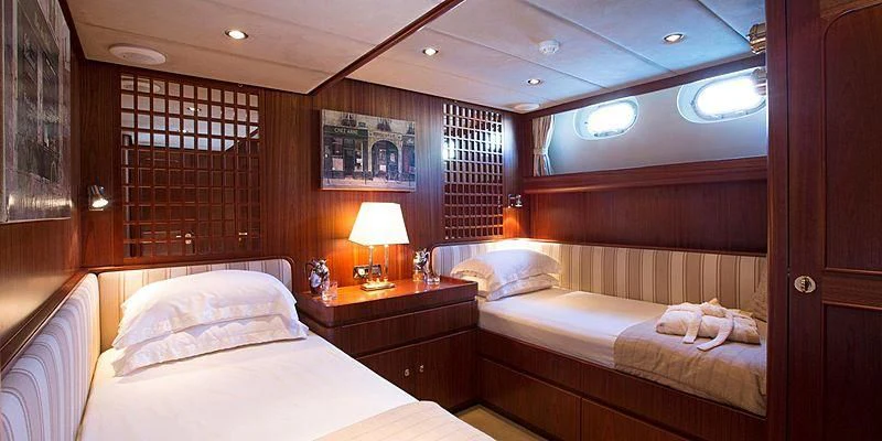 a room with two beds aboard INFATUATION Yacht for Sale