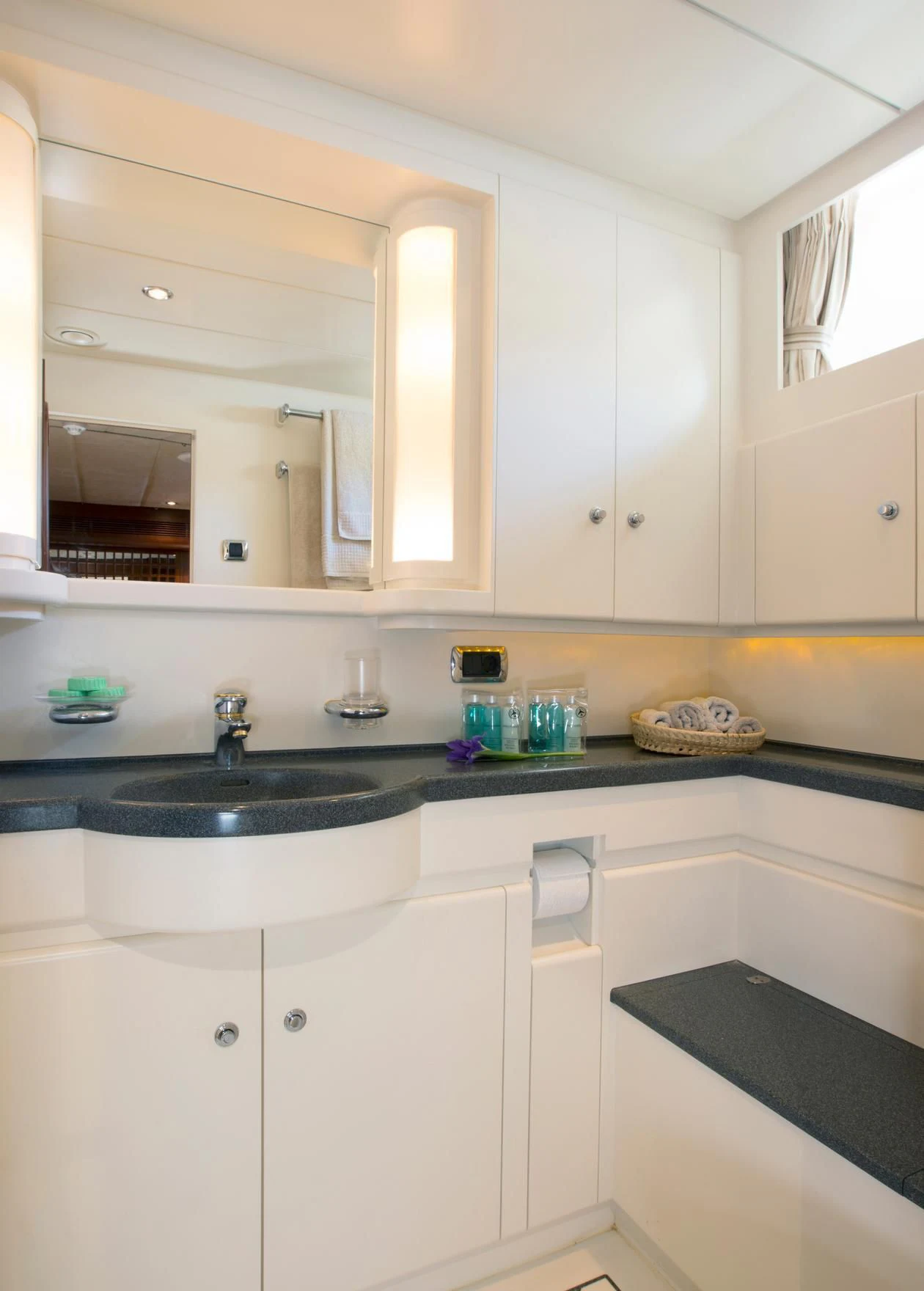a kitchen with white cabinets aboard INFATUATION Yacht for Sale