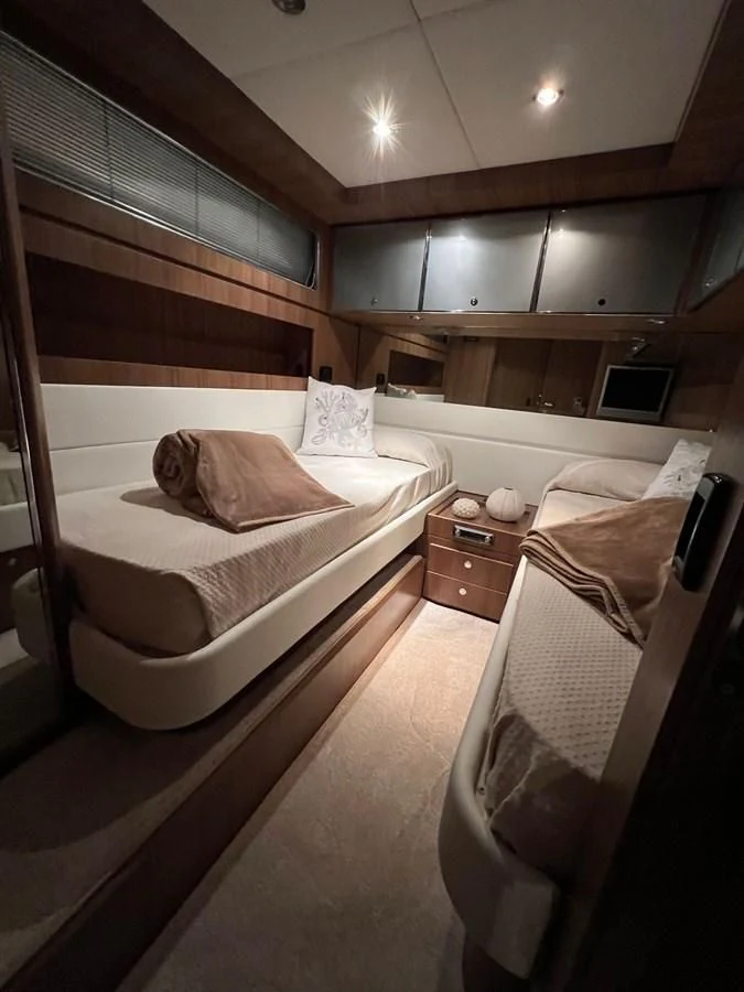 a couple of beds in a room aboard ALTER EGO Yacht for Sale
