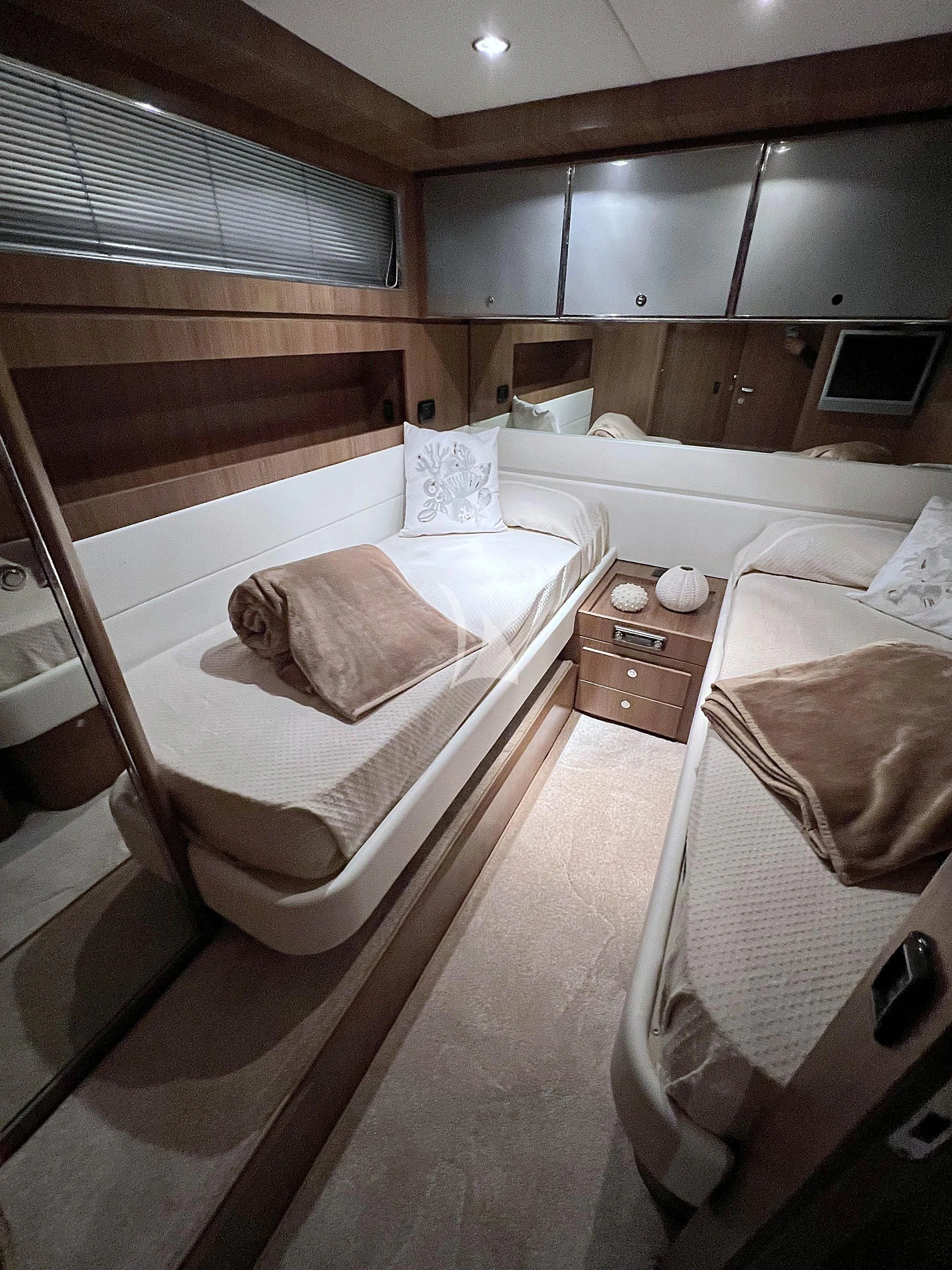 a bathroom with a bed and a sink aboard ALTER EGO Yacht for Sale