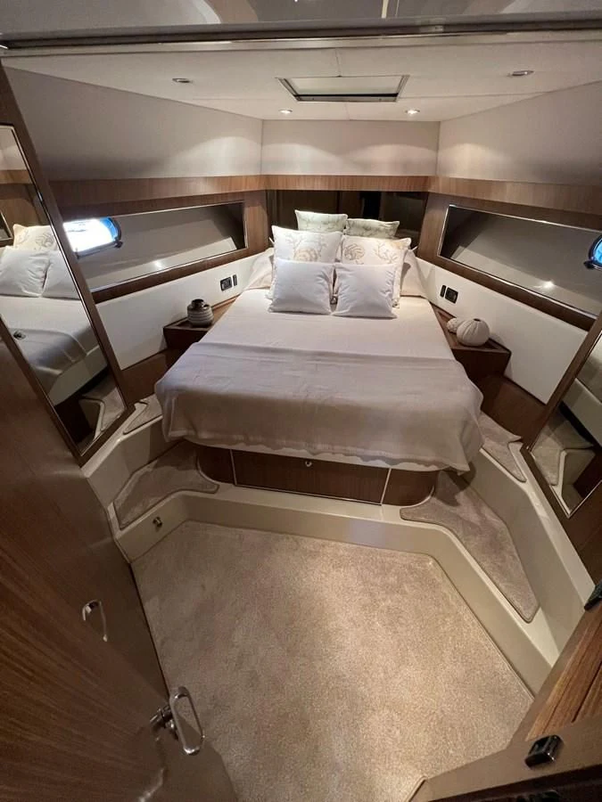 a room with a couple of beds aboard ALTER EGO Yacht for Sale