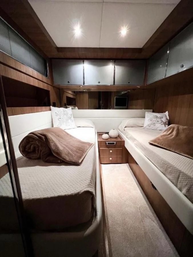 a room with two beds aboard ALTER EGO Yacht for Sale