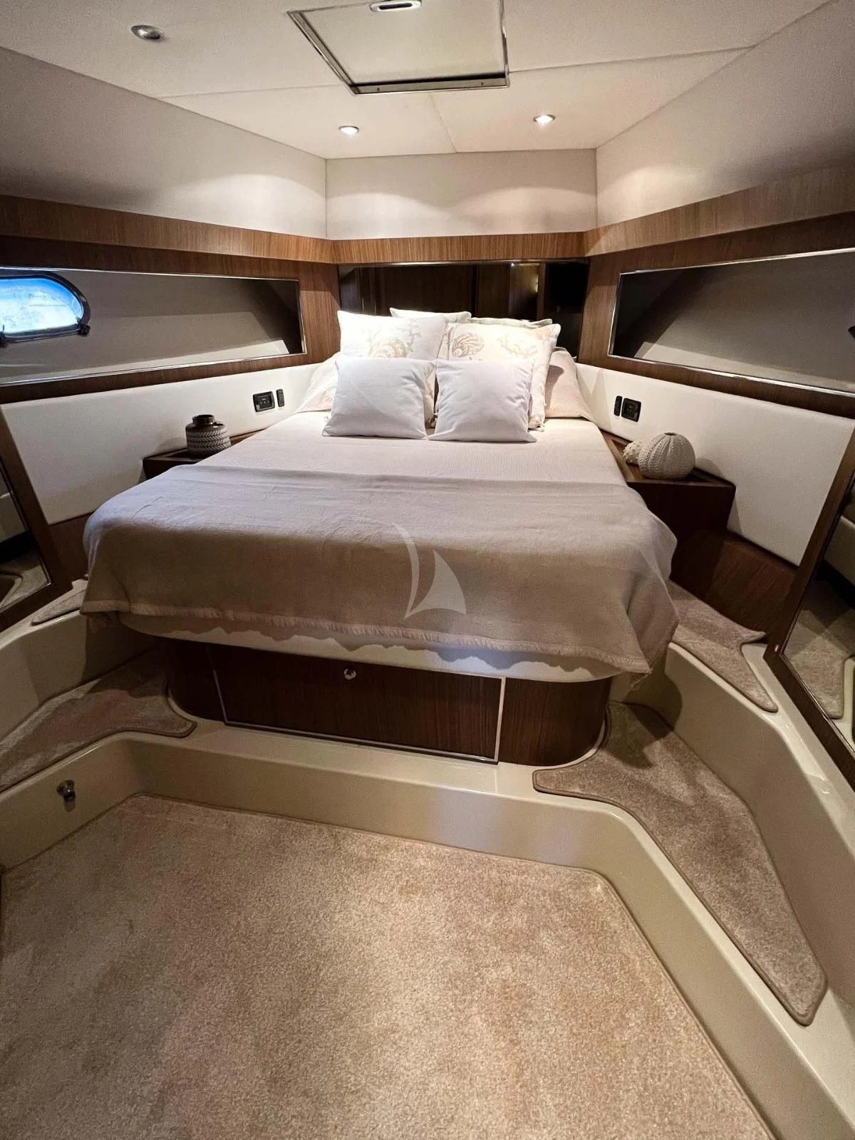 a room with a bed and a window aboard ALTER EGO Yacht for Sale