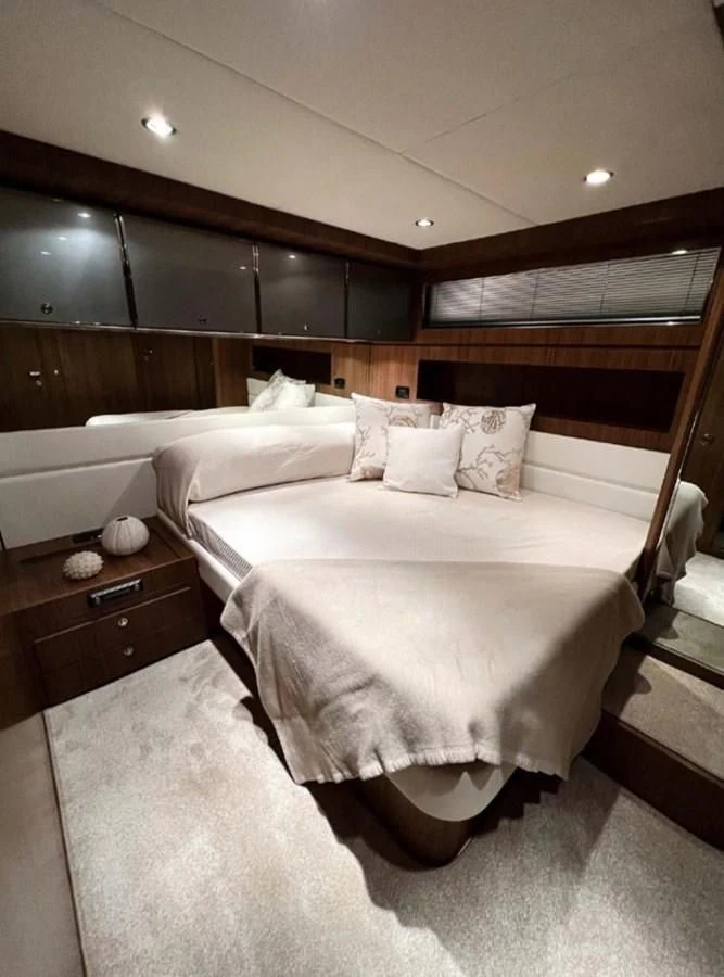 a bed with white sheets aboard ALTER EGO Yacht for Sale